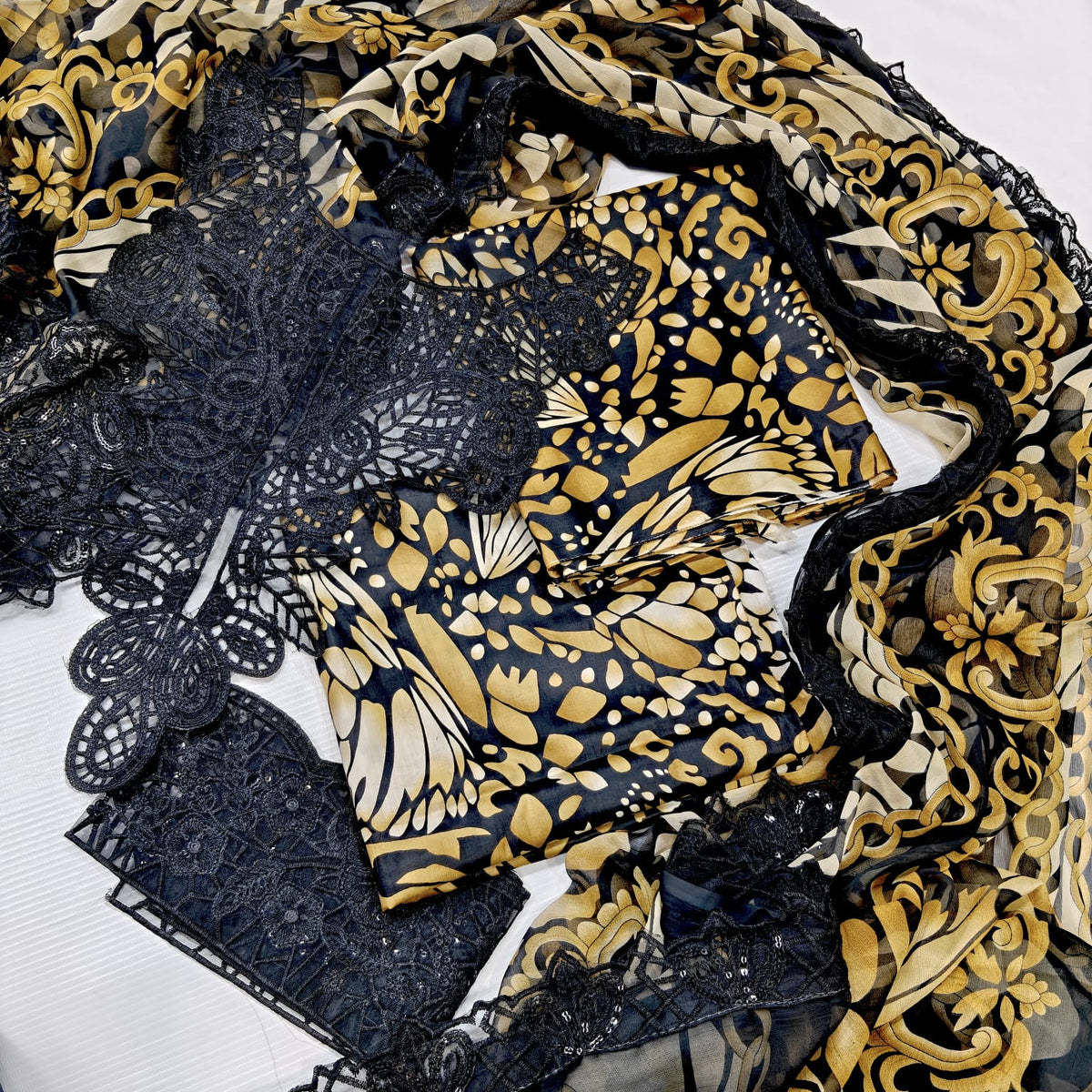 Maria B Printed Embroidered Lawn 3PC Unstitched Suit with Chiffon Dupatta – Black & Mustard